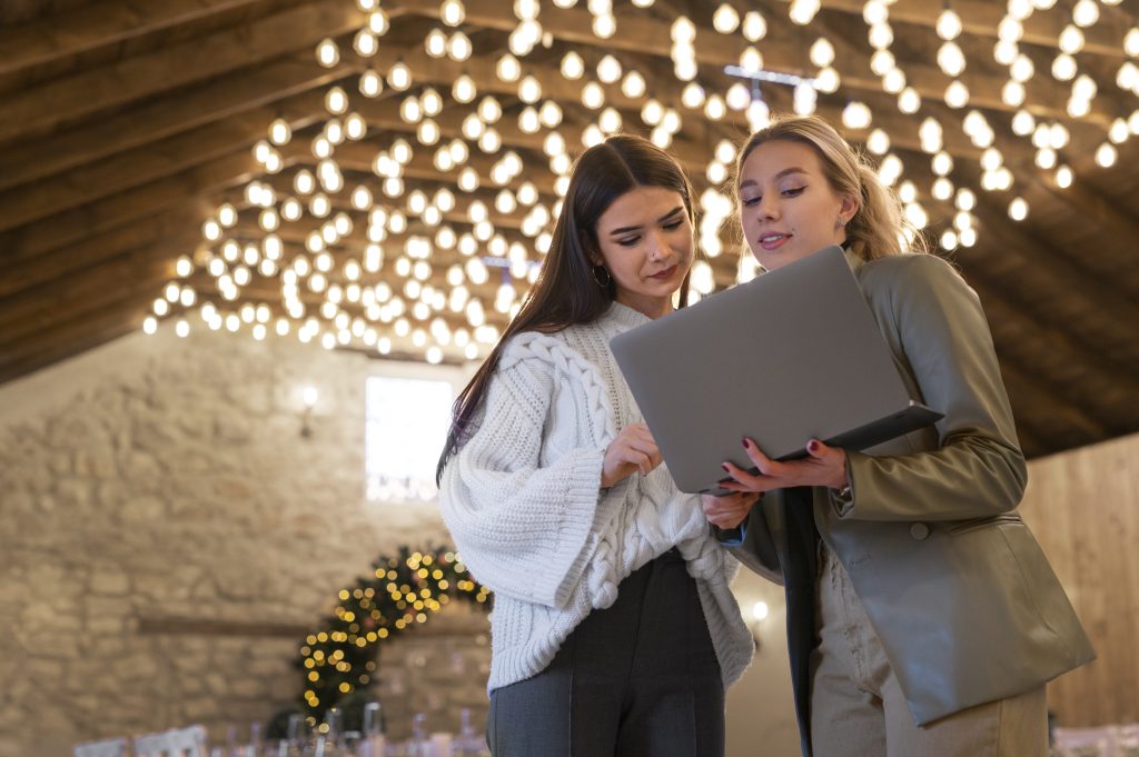 female wedding planner working with client